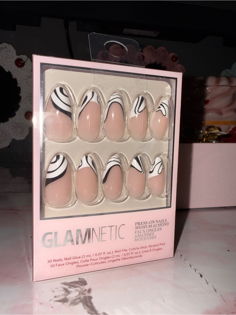 GLAMNETIC Nude Medium Almond Press-On Nails with Black & White Swirl Tips